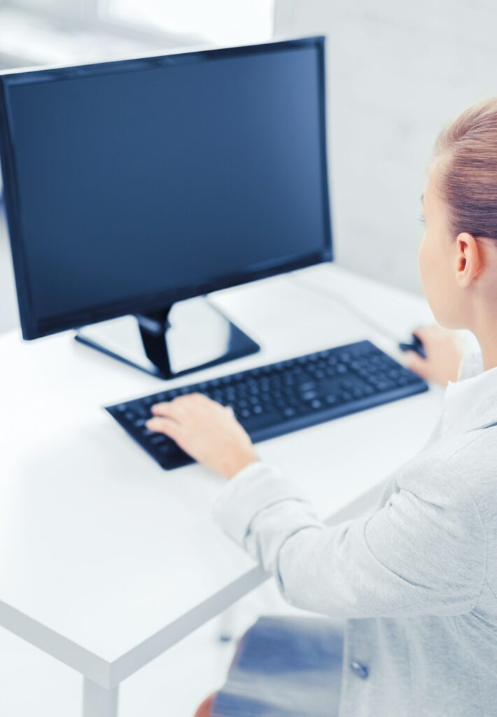 businesswoman with computer in office