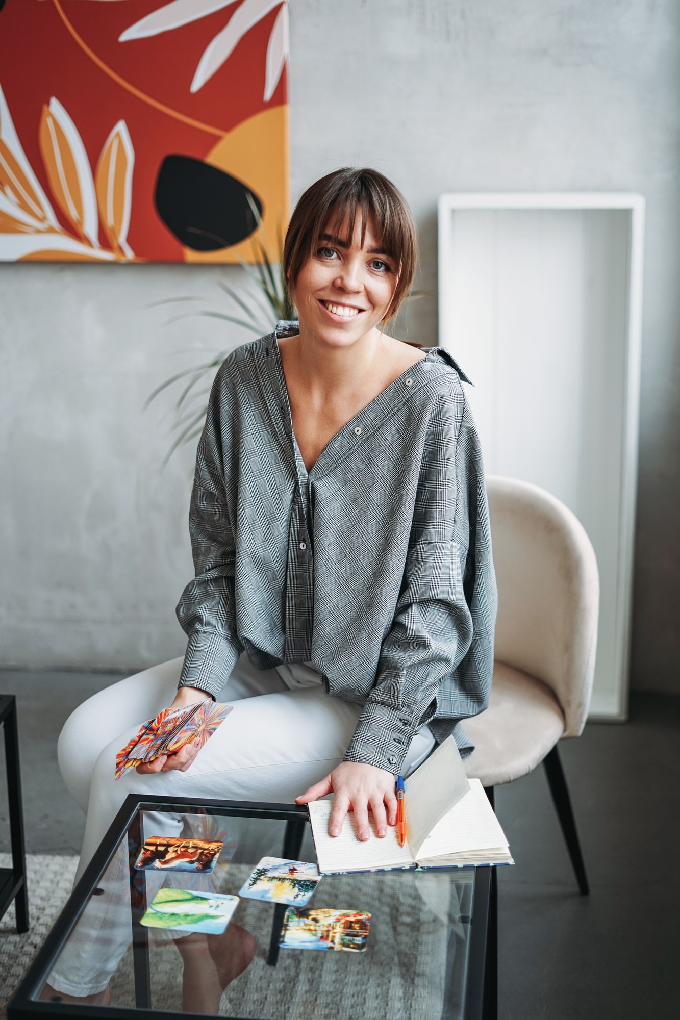 Working young brunette woman psychologist with laptop in modern office