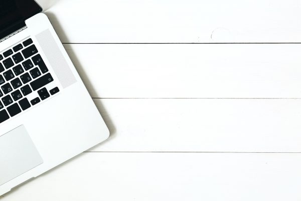 laptop-on-the-white-wooden-desk (1)