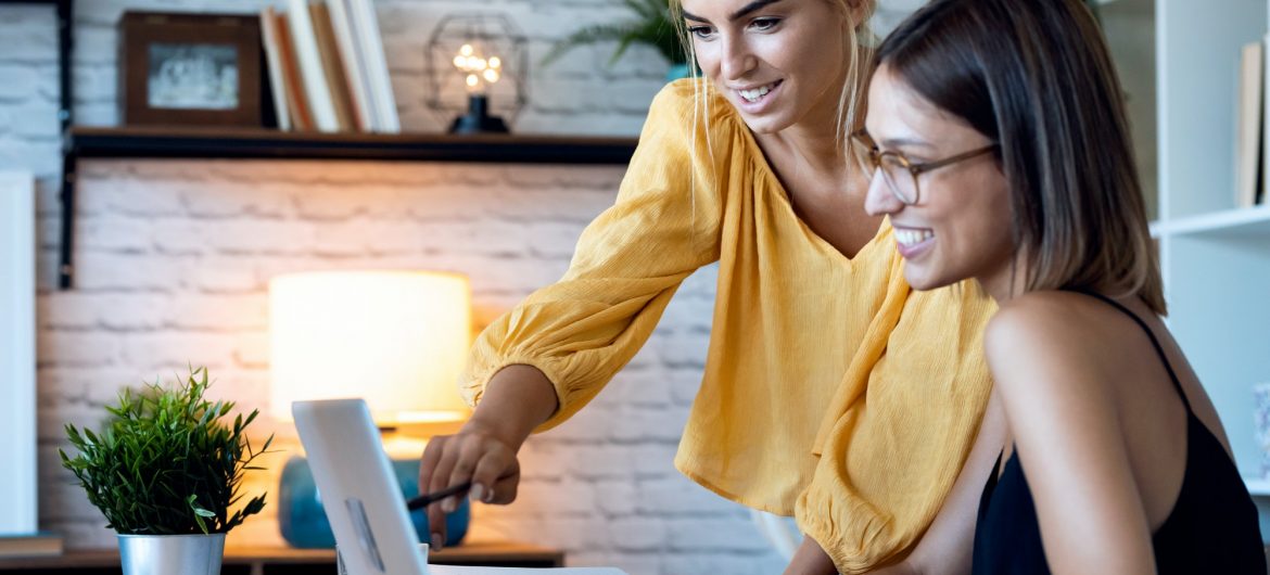 Two freelance business women in their startup small business.